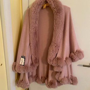 One size fits all pink fur trimmed ruffle cape/jacket.